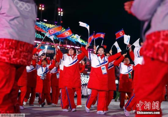 当地时间2月25日，2018平昌冬奥会闭幕式在平昌奥林匹克体育场举行，现场演出精彩夺目。图为朝韩代表团运动员入场。